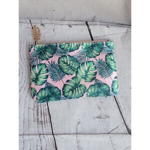 Ipsy Glam Bag August 2022 pink makeup bag with palm leaves design and leaf charm